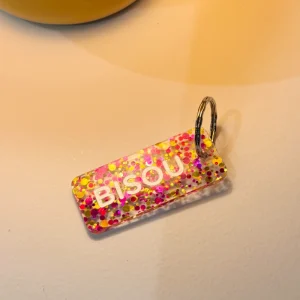 Porte-clés pailleté ‘Bisou’ Fuchsia-Or | PLUS DE LOVE